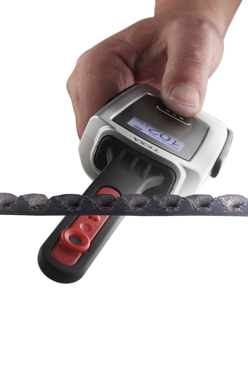 TEXA TTC Tensioner tool in use under a Ducati motorcycle timing belt during tension measurement